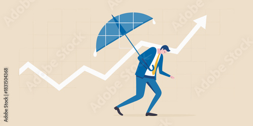Businessman holding umbrella against rising graph symbolizing protection
