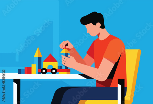 A person in a red shirt stacks blocks on a white table, a yellow chair on the right, all on a blue backdrop