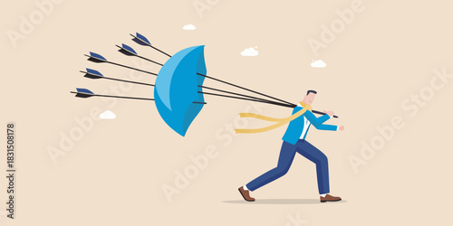 Businessman uses umbrella to block incoming arrows symbolizing protection