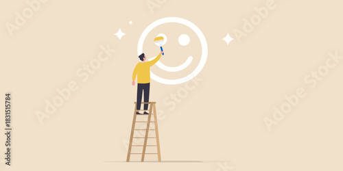 Person painting a large smiley face on a wall with a brush