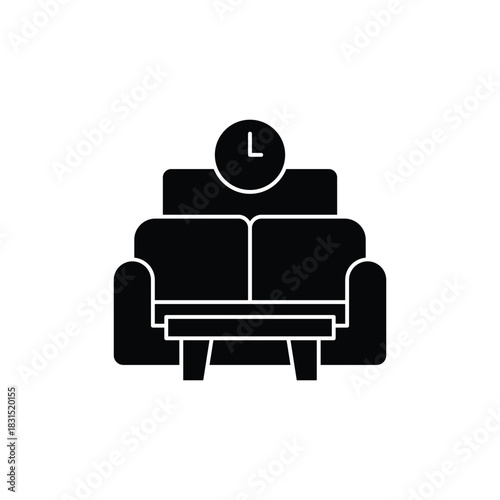 A black silhouette icon of a comfortable sofa with a clock symbol above it, representing waiting time or relaxation.