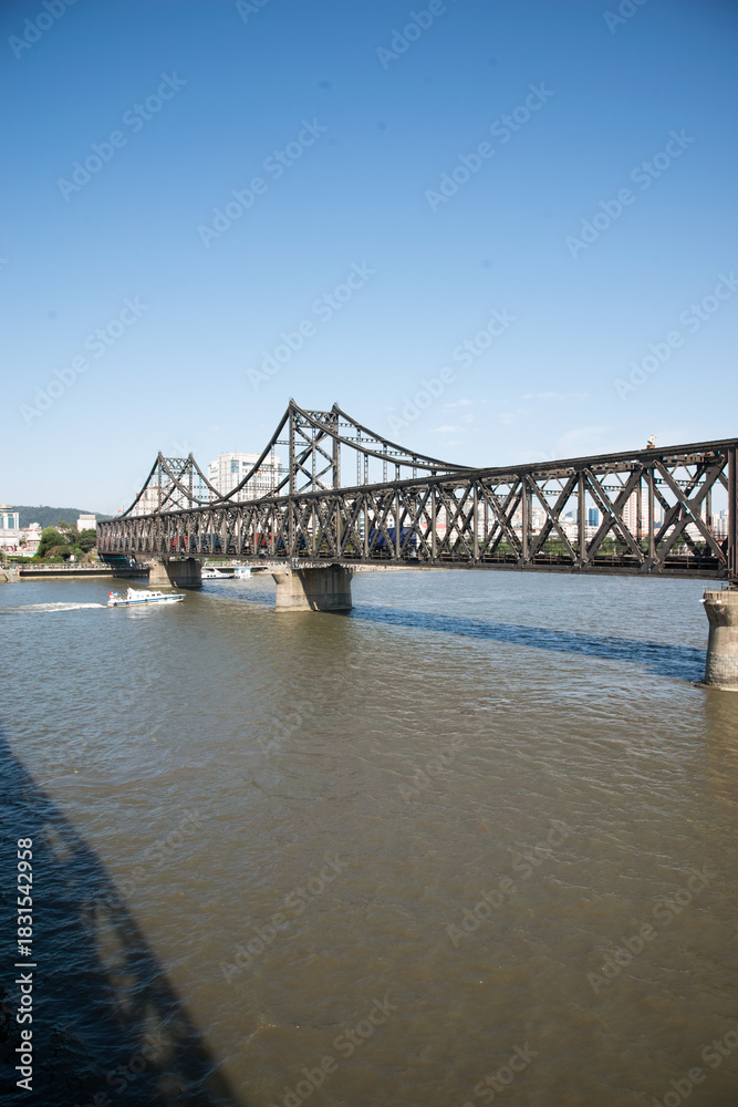 Naklejka premium Yalu River Bridge at Dandong, Liaoning Province, China