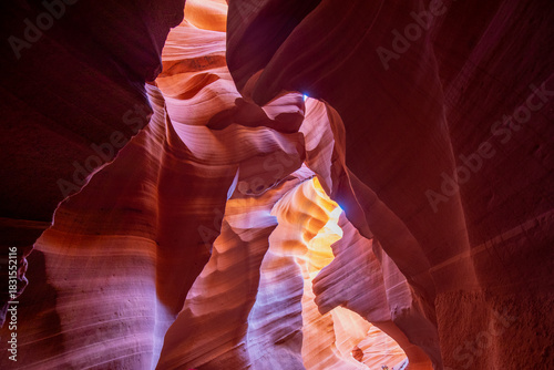 Antelope Canyon offers a breathtaking view with its vibrant rock formations and narrow passageways on Arizonas Indian reservation. The place is a mustvisit for adventure seekers. Popular place in USA.