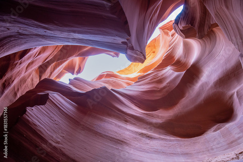 Antelope Canyon offers a breathtaking view with its vibrant rock formations and narrow passageways on Arizonas Indian reservation. The place is a mustvisit for adventure seekers. Popular place in USA.