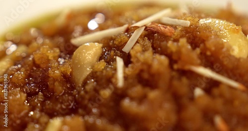 Moong dal halwa is a classic Indian sweet dish made with moong lentils, sugar, ghee and cardamom powder