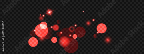 Glowing red bokeh circles float on dark background, creating dreamy light effects with sparkles and luminous particles for artistic holiday decorations and warm atmospheric overlays.