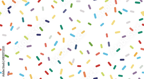 Colorful sprinkles isolated on white background create a festive and playful pattern, perfect for adding a touch of joy to any design or celebration project