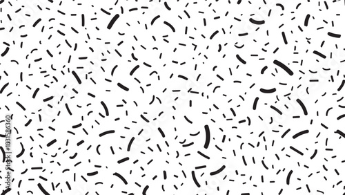 Black and white seamless abstract pattern with hand-drawn chaotic sprinkles, dashes, and strokes in a minimalist graphic design style for a modern and playful texture