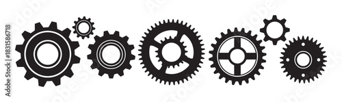 Collection of black gear wheel silhouettes in various sizes and designs arranged horizontally in a row, representing a mechanical system, engineering, or industrial process
