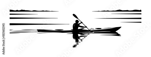 Serene silhouette of kayaker paddling across tranquil lake at sunrise or sunset