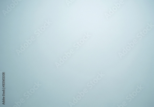 Minimalist cool-toned wall background with a subtle radial gradient and soft matte finish, creating a serene and clean aesthetic