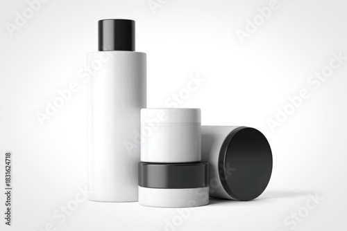 Minimalist white cosmetic bottles and jars with black lids