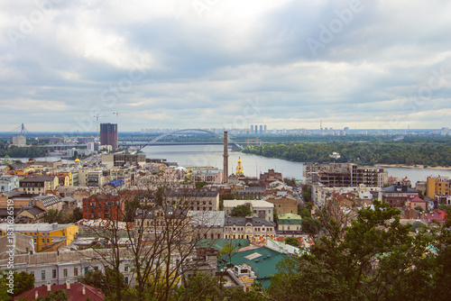 St. Nicholas Church on the Water with Podil Embankment Buildings and Podil Bridge at Kyiv, Ukraine