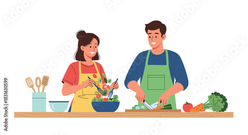 Happy young couple cooking a healthy salad together in the kitchen showing teamwork and a healthy lifestyle at home.