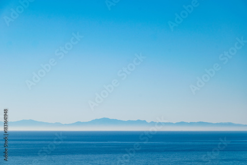 Distant Mountain Range of Africa Over the mediterranean sea Horizon 