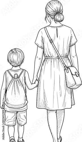 Back view of a mother and her young son walking hand in hand together on a sunny day