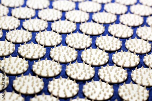 Massage mat with spikes. A useful massager for health. 