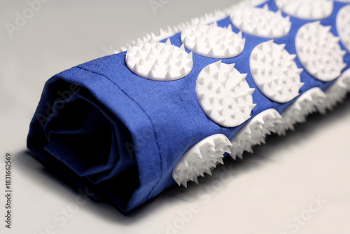 Massage mat with spikes. A useful massager for health. 