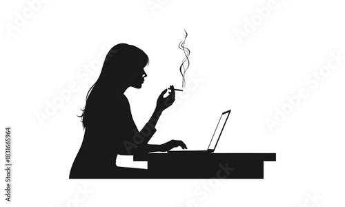 Silhouette of a woman smoking while working in front of a laptop at a desk.