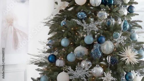 Decorated evergreen tree with ornaments and soft lighting holiday concept