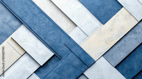 A close-up shot of an abstract geometric pattern composed of blue, white, and gray rectangles arranged in an interwoven design. The image has a modern and minim