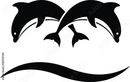 Elegant minimalist vector illustration featuring two black dolphin silhouettes dynamically leaping over a stylized wave, creating a striking high contrast design element