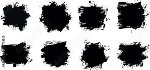 Collection of eight black ink brush strokes for grunge backgrounds and textures