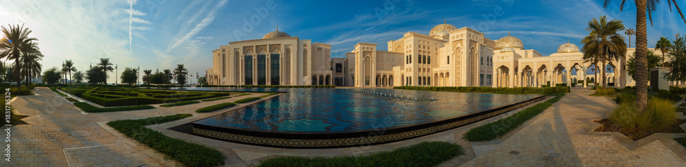 Fototapeta premium Eastern architecture, ancient-style buildings, domes and round roofs, arches and columns. On the streets of the Emirates, in public places.