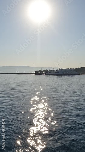 Corfu Town Greece harbor approach with bright sun glare and strong reflections