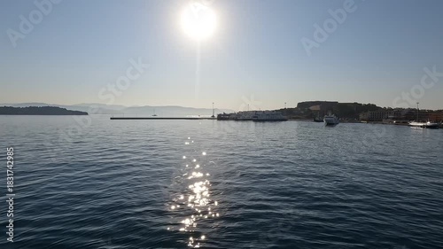 Corfu Town Greece harbor approach with bright sun glare and strong reflections