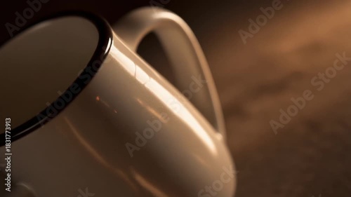 Wallpaper Mural Closeup of a white mug with a dark rim on a textured brown surface Torontodigital.ca