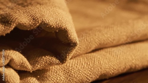 Wallpaper Mural Closeup of folded textured tan fabric with dramatic lighting Torontodigital.ca