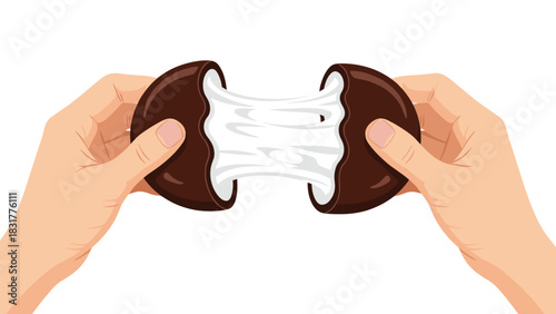 Satisfying marshmallow creme filling pull as chocolate cookie is broken apart by hands ready to be enjoyed as a sweet treat