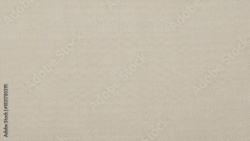 Close up view of a light beige fabric texture showing a woven pattern in high detail and uniformity