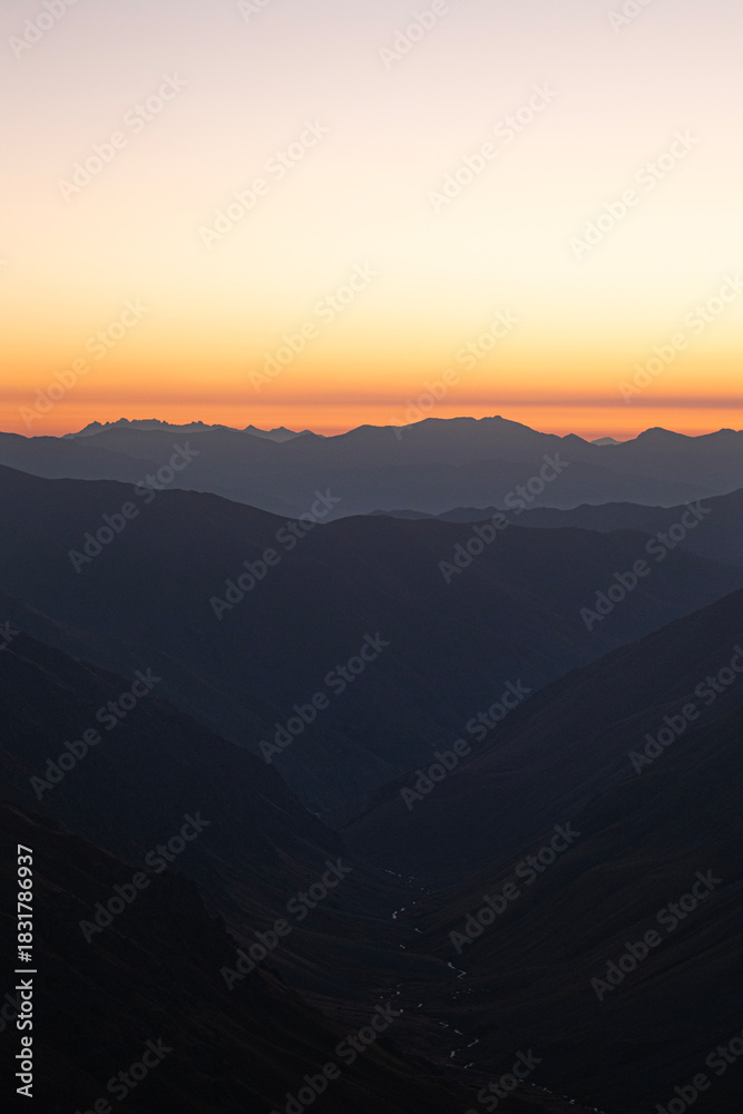 Obraz premium Watching the sunrise from the Kaçkar Mountains. Sunrise from Kaçkar Peak. Hiking towards Kaçkar Peak in the early morning. Magnificent view from Kaçkar Peak. Rize, Türkiye. 