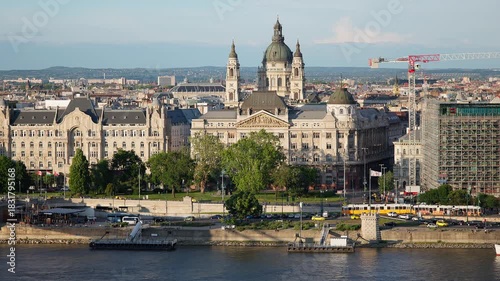 Budapest cathedral and city with traffic and trams. Hungary