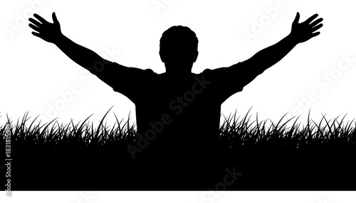 Silhouette of a person with open arms in nature's grassy setting