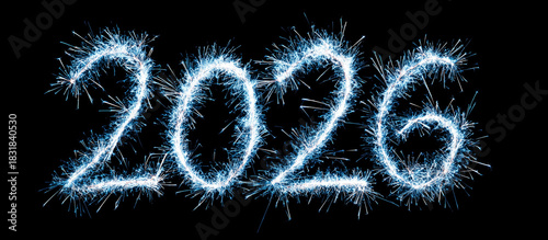 Sparkling “2026” written with bright blue fireworks against a dark background banner.