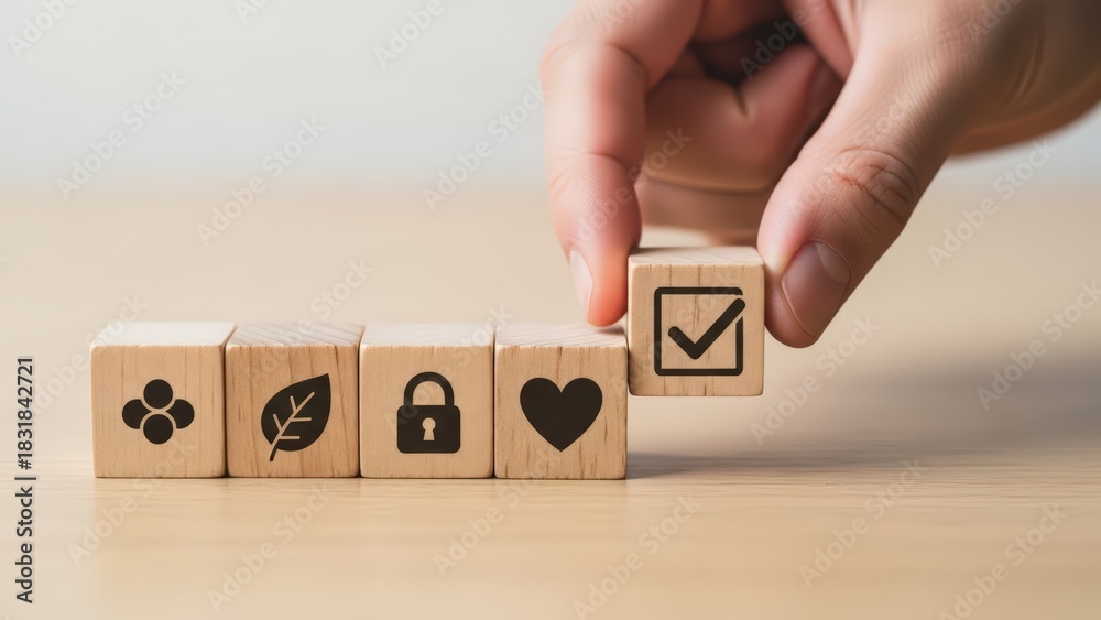 Naklejka premium Hand places wooden checkmark block completing important life values choice and quality selection on table