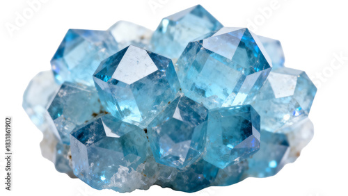 Collection of sparkling blue crystals on white rock in natural setting
