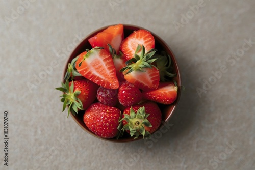 Bowl of Fresh Strawberries and Sliced Strawberries - Healthy Snack