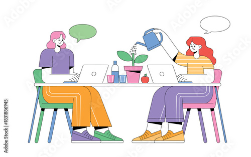 Two colleagues collaborate and nurture a growing plant while working on laptops at a shared desk.