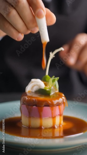 Chef Plating Unique Dessert with Dynamic Explosion of Ingredients at Creative Dining Experience for Presentation and Shared Culinary Feast