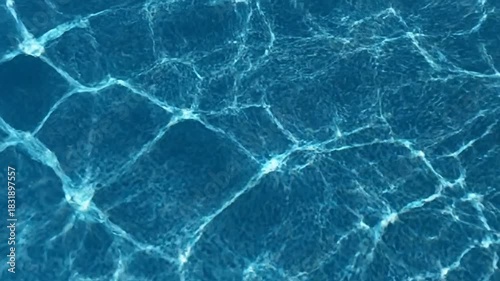 Rippling Blue Water Surface With Light Reflections Overhead ripples waves