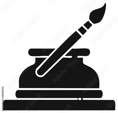 Classic inkwell and artistic paintbrush silhouette for creative expression and design projects