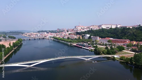 Aerial orbit of Coimbra and the University of Coimbra over the Mondego River