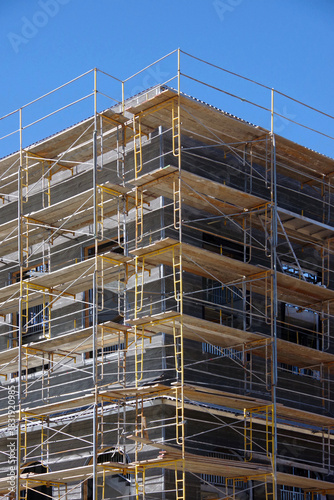 Scaffolding at a new building construction site