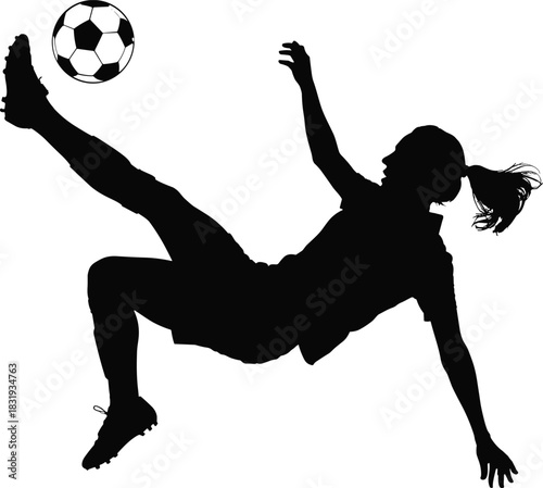 Black silhouette of a woman playing soccer with a ball