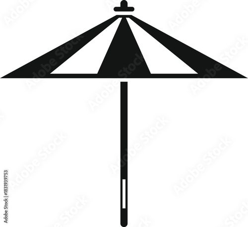 Black and white striped beach umbrella offering protection from the sun