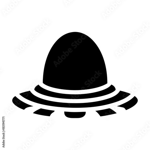 Black silhouette of a classic flying saucer ufo